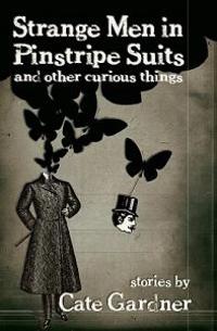 Strange Men in Pinstripe Suits & Other Curious Things